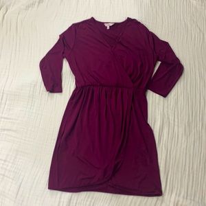 Maroon mid length dress.